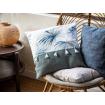 Coussin imprimé "palmier" à pompons