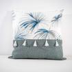 Coussin imprimé "palmier" à pompons
