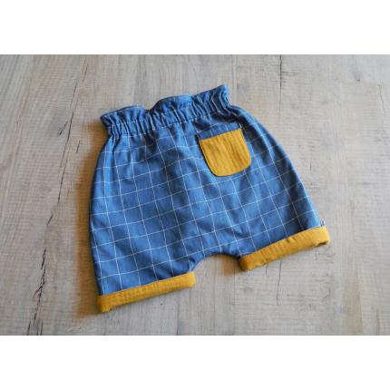 Short réversible bébé en coton bio à carreaux jaune et bleu