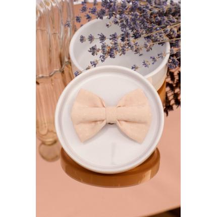 Noeud à clipser tissu à relief brillant rose poudré très clair