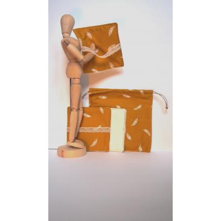 Lot 7 cotons lavables Plumes blanches, à adopter avec douceur.