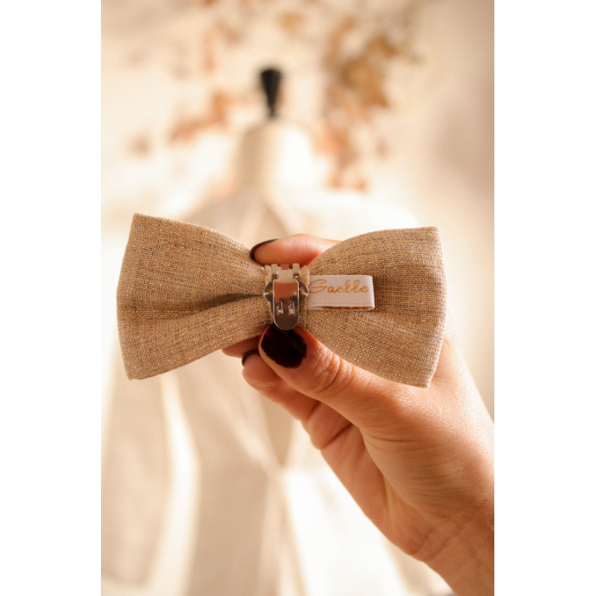 Noeud cache-agrafes à clipser doré