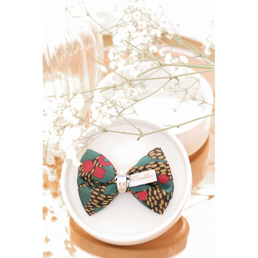 Noeud à clipser doré, noir, rouge et vert