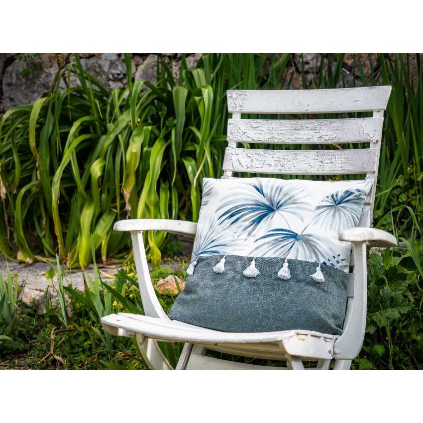 Coussin imprimé "palmier" à pompons