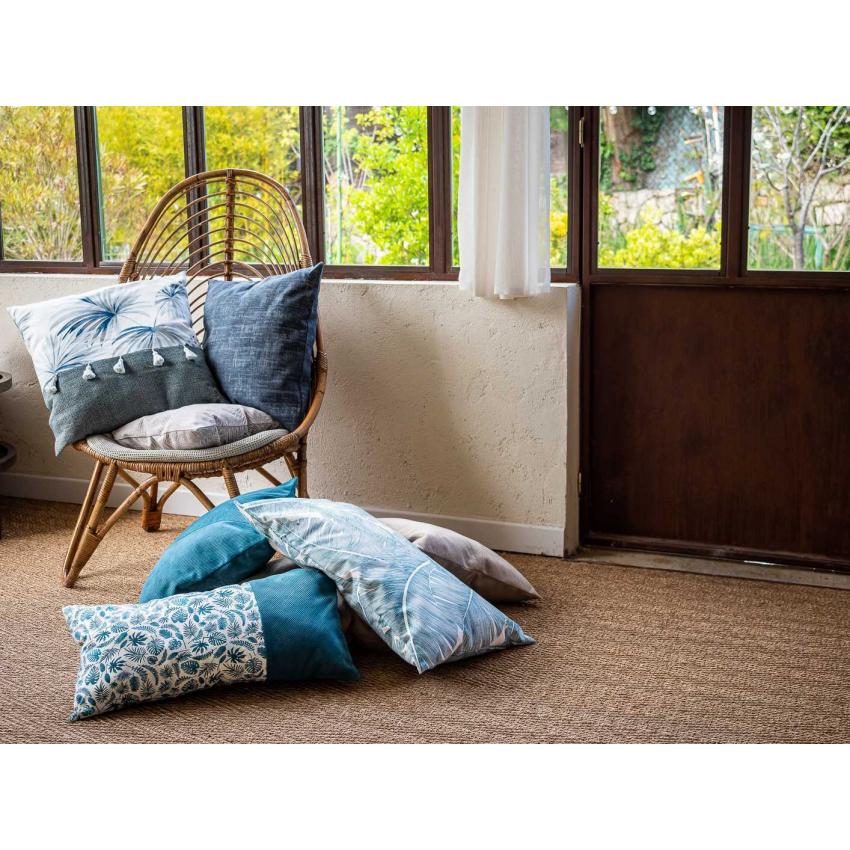 Coussin imprimé "feuilles" et velours